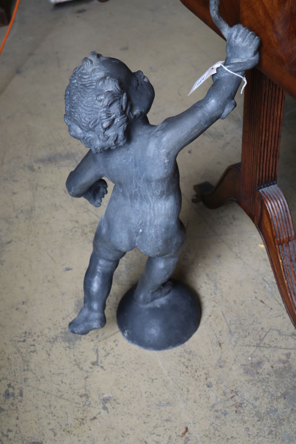 A Victorian lead putto garden fountain, height 68cm